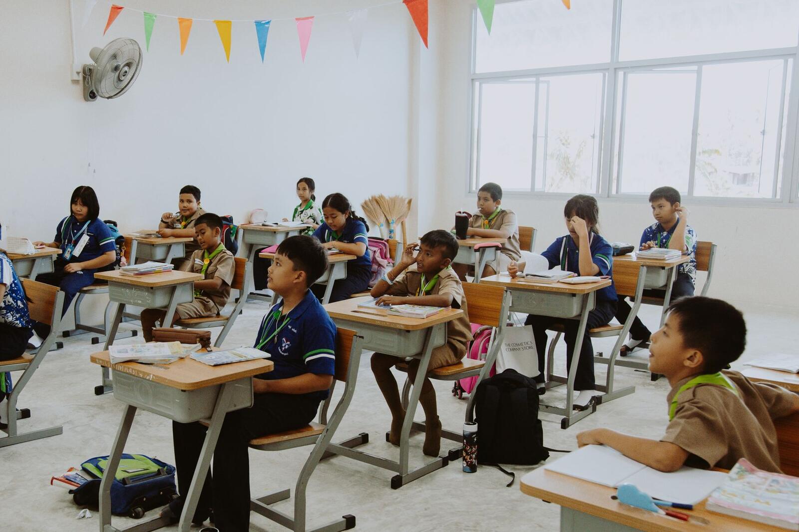 Pupils at their desks in a classroom